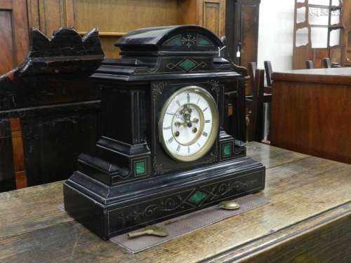 A French black marble mantel clock, circa 1900, the architectural case with malachite inserts and
