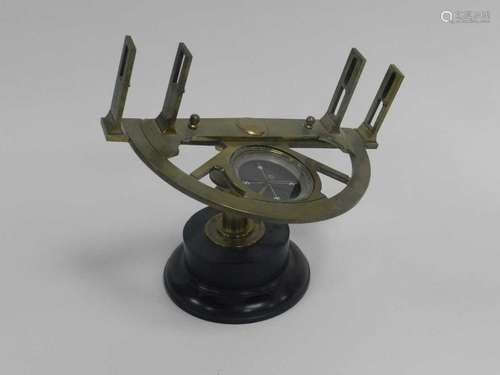 A 19th-century brass graphometer, semi-circular frame with 180-degree scale and adjustable sights,