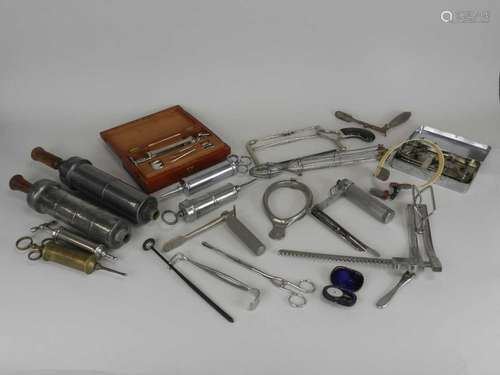 A large collection of medical equipment, early to mid 20th century, including surgical and general