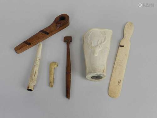 A group of prisoner of war treen and bone carvings, including a book mark from Bermuda dated 1802, a