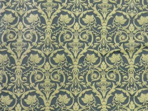 A pair of recent damask curtains, with a champagne Jacobean style formal pattern on a green