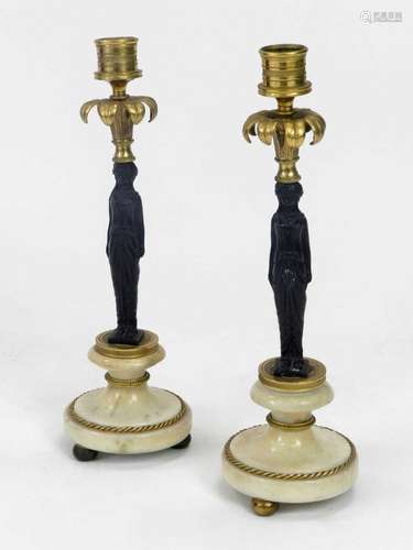 A pair of Regency bronze, gilt bronze and marble candle sticks in the form of classical figures with