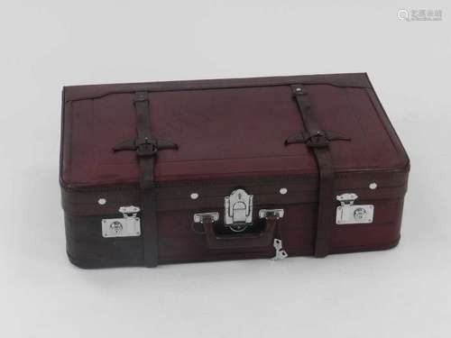 A recent vintage leather suitcase, in dark red with chromium fittings, the interior lined with