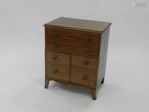 A George III style mahogany cabinet, converted from a 19th century commode, the moulded top above