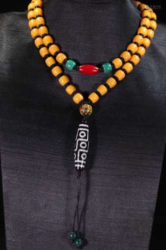 A Yellow Sherpa Glass Bead Necklace With Nine-Eye Dzi