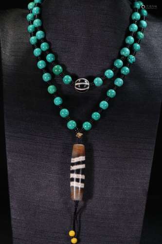 A Sherpa Glass Bead Necklace With Dzi