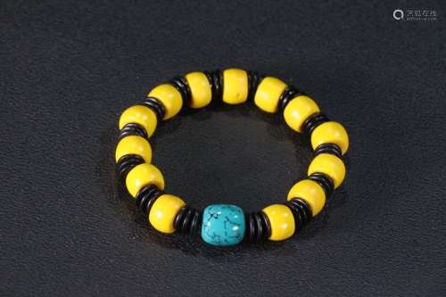 A Sherpa Glass Bead Bracelet With Turquoise Stone