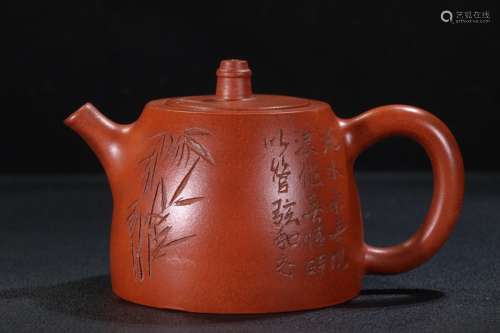 A Zisha Teapot With Poetry Carving