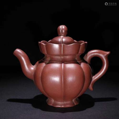 A Zisha Teapot Of Melon Carving