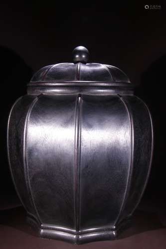 A Rosewood Jar With Lid