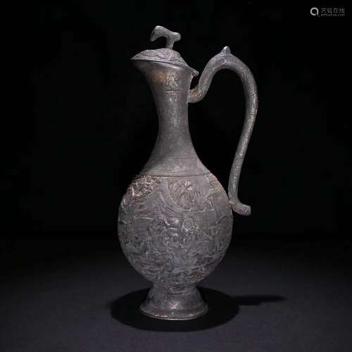 A Silver Pot With Carving