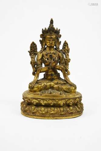 Sujet en bronze doré représentant la bodhisattva Vajradhara assis en padmasana sur un double lotus, les mains croisées devant lui, en vitarka mudra, geste de l'argumentation, des tiges de lotus remontant le long des bras, les fleurs, à hauteur des épaules, portant les attributs de la divinité, le vajra et la gantha. Base non scellée. Tibet, XVIIIe siècle. (Usure de la dorure, manque des cabochons) H. 18 cm Provenance : Collection du Baron de M., administrateur des Douanes en Chine dans les années 1920. Puis par descendance.Expert : Cabinet Ansas et Papillon Pour participer aux enchères du lot 79 une caution sera demandée.To bid on this lot 79, a deposit will be required.Pas d'enchères en LIVE / No bid in Live