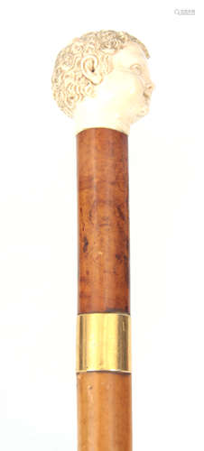 A 19TH CENTURY MALACCA WALKING STICK BY JONATHAN HOWELL with finely carved ivory Roman style head