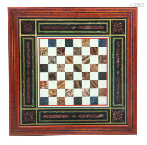 A 19TH CENTURY FRAMED PAINTED CHESS BOARD SLATE TABLE TOP simulating coloured marbles within a