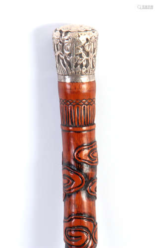 A LARGE 19TH CENTURY CARVED MALACCA CHINESE WALKING STICK with carved shaft depicting animals and