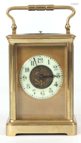 A LATE 19TH CENTURY FRENCH BRASS EIGHT-DAY REPEATING CARRIAGE CLOCK with masked dial and filigree