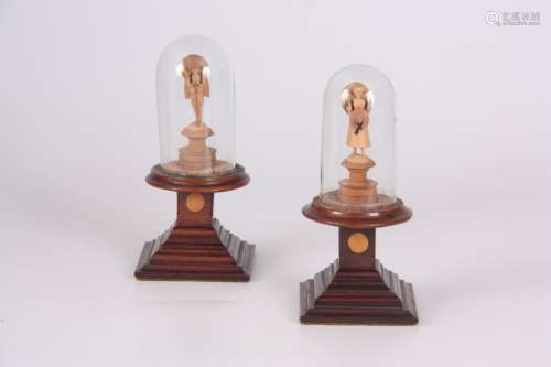 A PAIR OF LATE 19TH CENTURY CONTINENTAL MINIATURE CARVED FIGURES modelled as a male and female