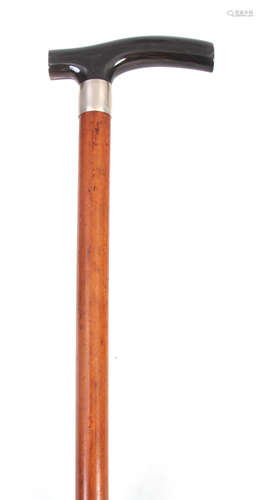 A 19TH CENTURY MALACCA AND HORN WALKING STICK BY SWAINEBRIGG with silver hallmarked collar and