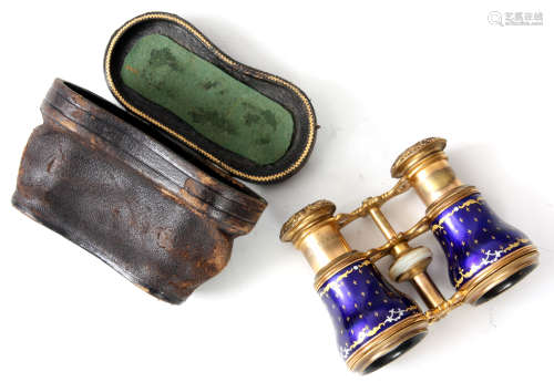 FLAMMARION A PAIR OF ORMOLU AND BLUE ENAMEL OPERA GLASSES with cast leaf work decoration to the