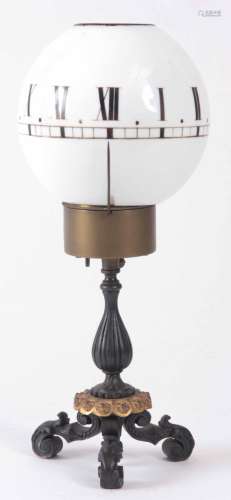 A LATE 19th CENTURY FRENCH NIGHT CLOCK having white glass shade with Roman numeral supported on a