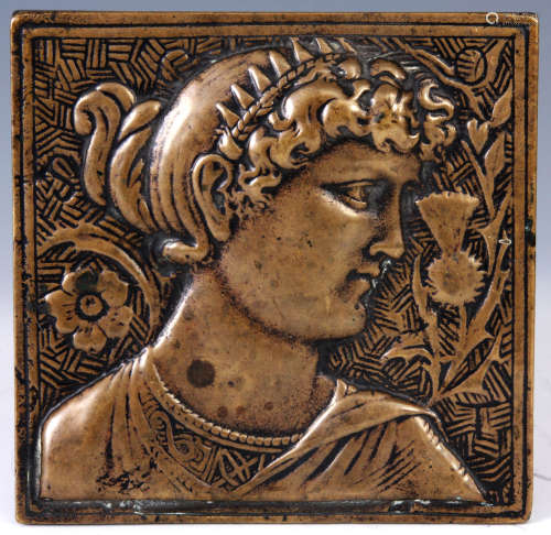 A LATE 19TH CENTURY CAST BRONZE PLAQUE IN THE PRE RAPHAELITE STYLE depicting the head and