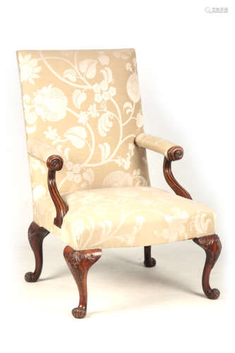 AN 18TH CENTURY IRISH STYLE GAINSBOROUGH CHAIR with unusual scrolled arms and upholstered shaped