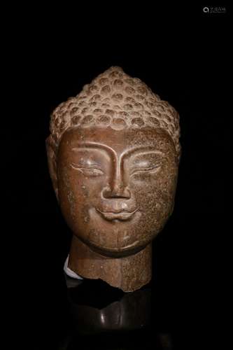 A Stone Buddha Head Ornament