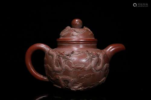 A Zisha Teapot With Dragon Carving