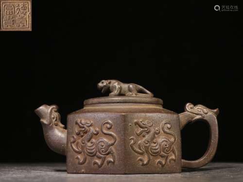 A Zisha Teapot With Dragon Carving