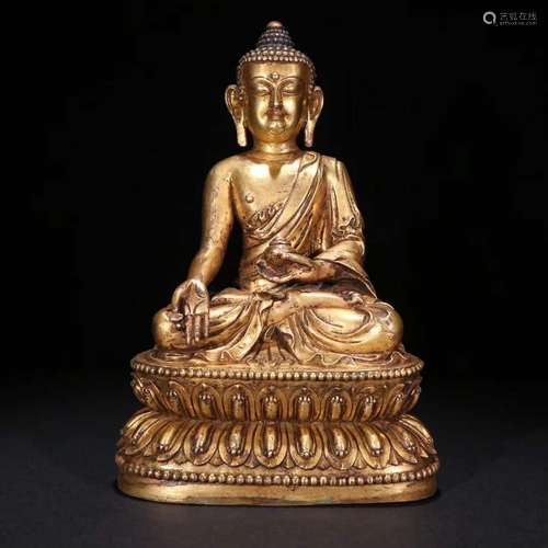 A Gilt Bronze Gautama Buddha Statue