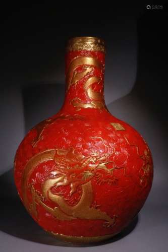 A Porcelain Red Glazed Dragon Carving Bottle Vase