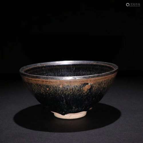 A Porcelain Black Glazed Bowl With Silver