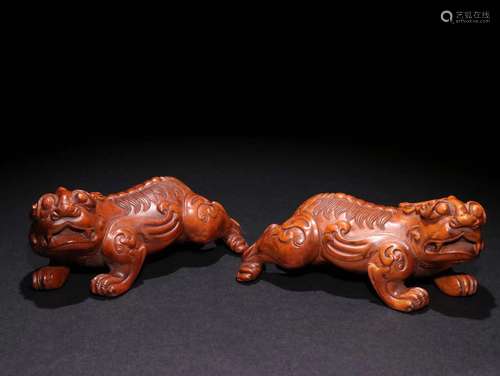 Pair Of Boxwood Beast Ornaments