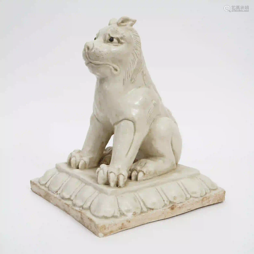 A White-glazed Lion, Tang Dynasty