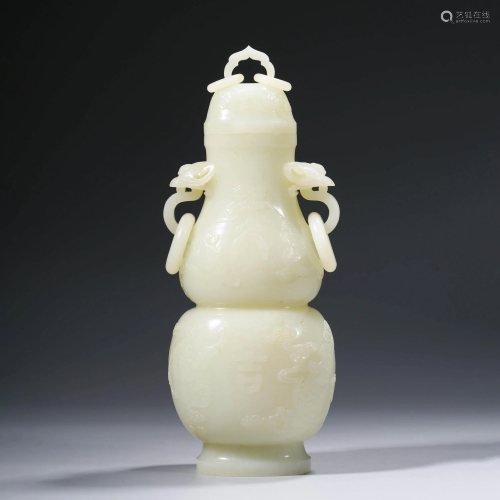 A CHINESE WHITE JADE DOUBLE-GOURD SHAPED VASE