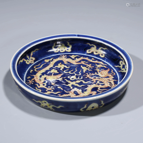 A CHINESE BLUE-GLAZED PORCELAIN DISH WITH JIAQING MA…