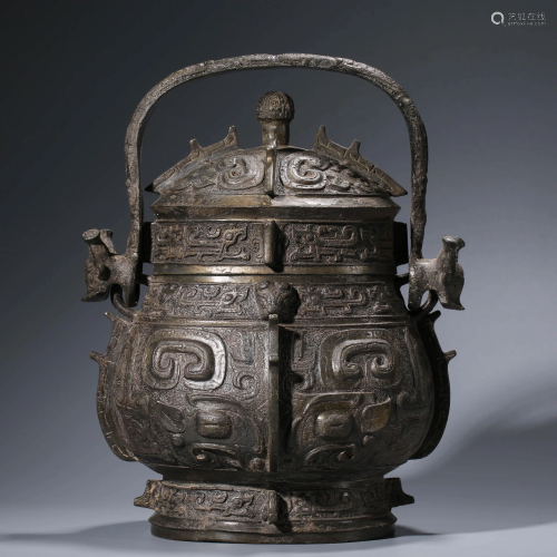 A CHINESE BRONZE WINE VESSEL