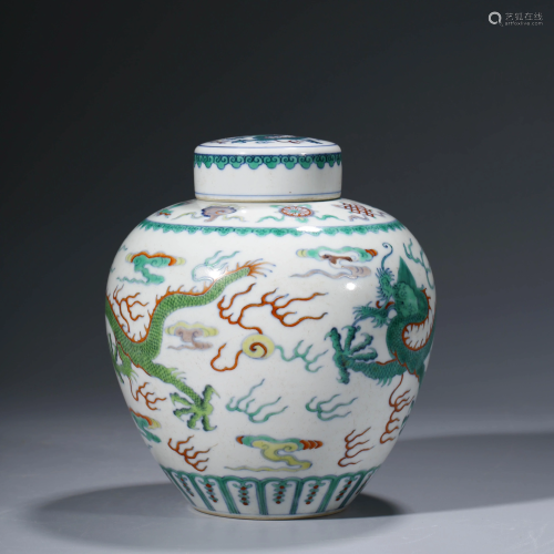 A CHINESE DOUCAI GREEN-GLAZED PORCELAIN JAR & COVER