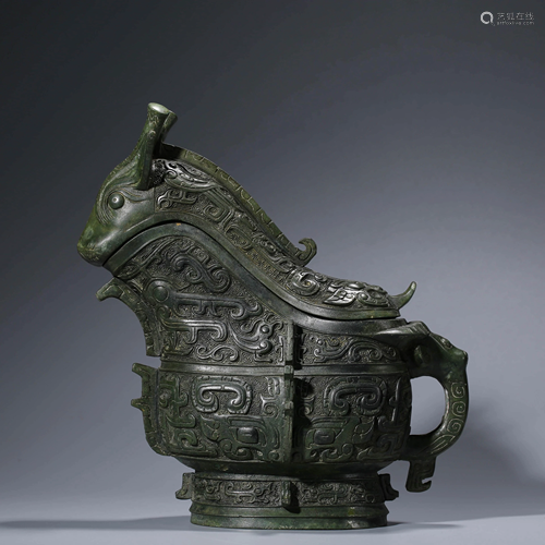 A CHINESE BEAST-SHAPED-HEAD BRONZE WINE VESSEL