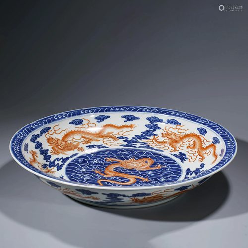 A CHINESE IRON-RED-GLAZED PORCELAIN DISH, QIANLONG MARK