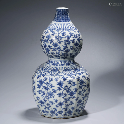 A CHINESE BLUE & WHITE WRAPPED FLORAL DOUBLE-GOURD