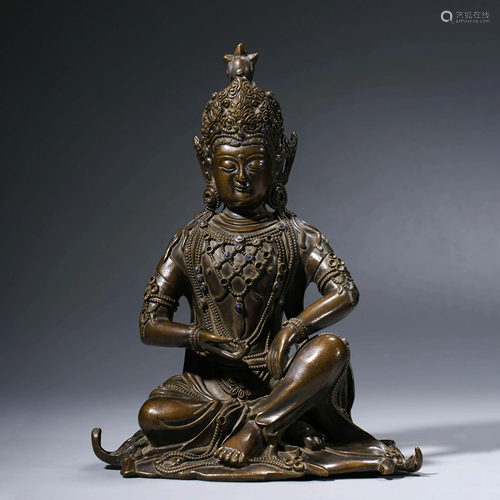 A CHINESE BRONZE AVALOKITESHVARA STATUE