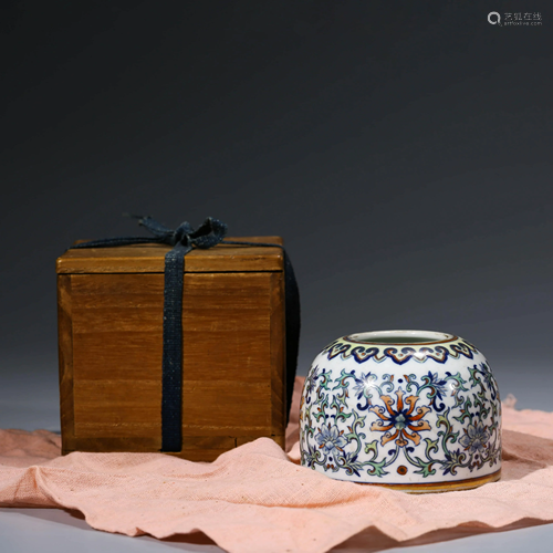 A CHINESE DOUCAI WRAPPED FLORAL PORCELAIN BRUS…