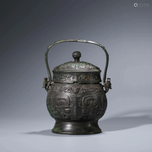 A CHINESE BRONZE WINE VESSEL & COVER