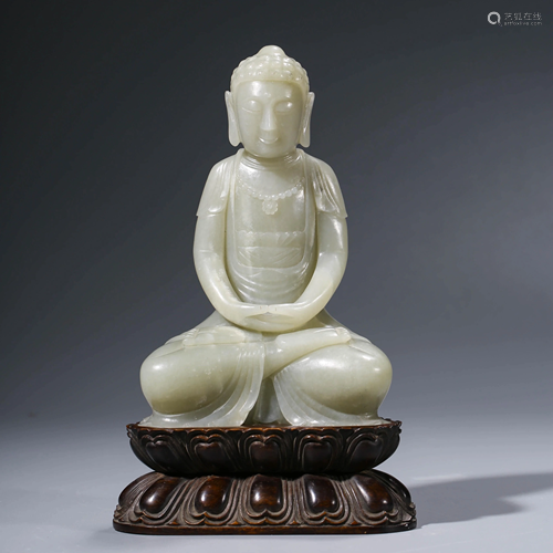 A CHINESE WHITE JADE SAKYAMUNI WITH STAND