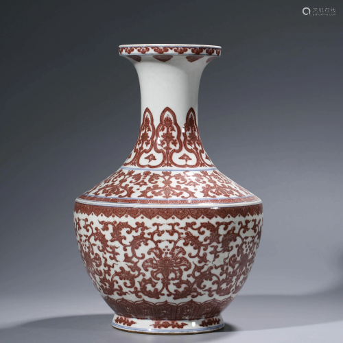 A CHINESE IRON-RED GLAZED WRAPPED PORCELAIN VASE,
