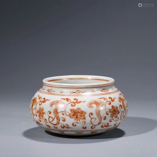 A CHINESE IRON-RED-GLAZED WRAPPED FLORAL PORCELAIN JAR