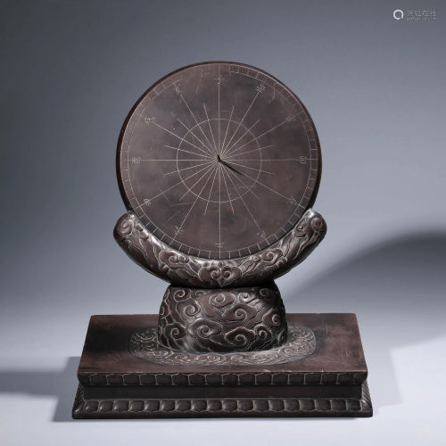 A CHINESE STONE SUNDIAL