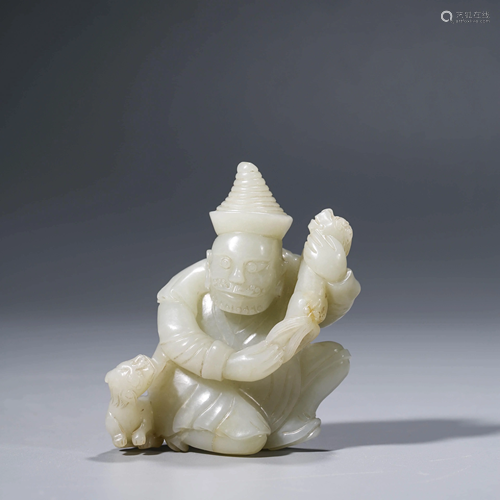 A CHINESE WHITE JADE MAN & BEAST