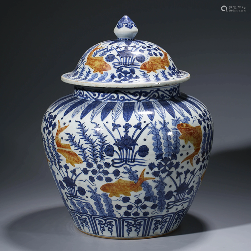 A CHINESE IRON-RED-GLAZED PORCELAIN JAR & COVER WITH